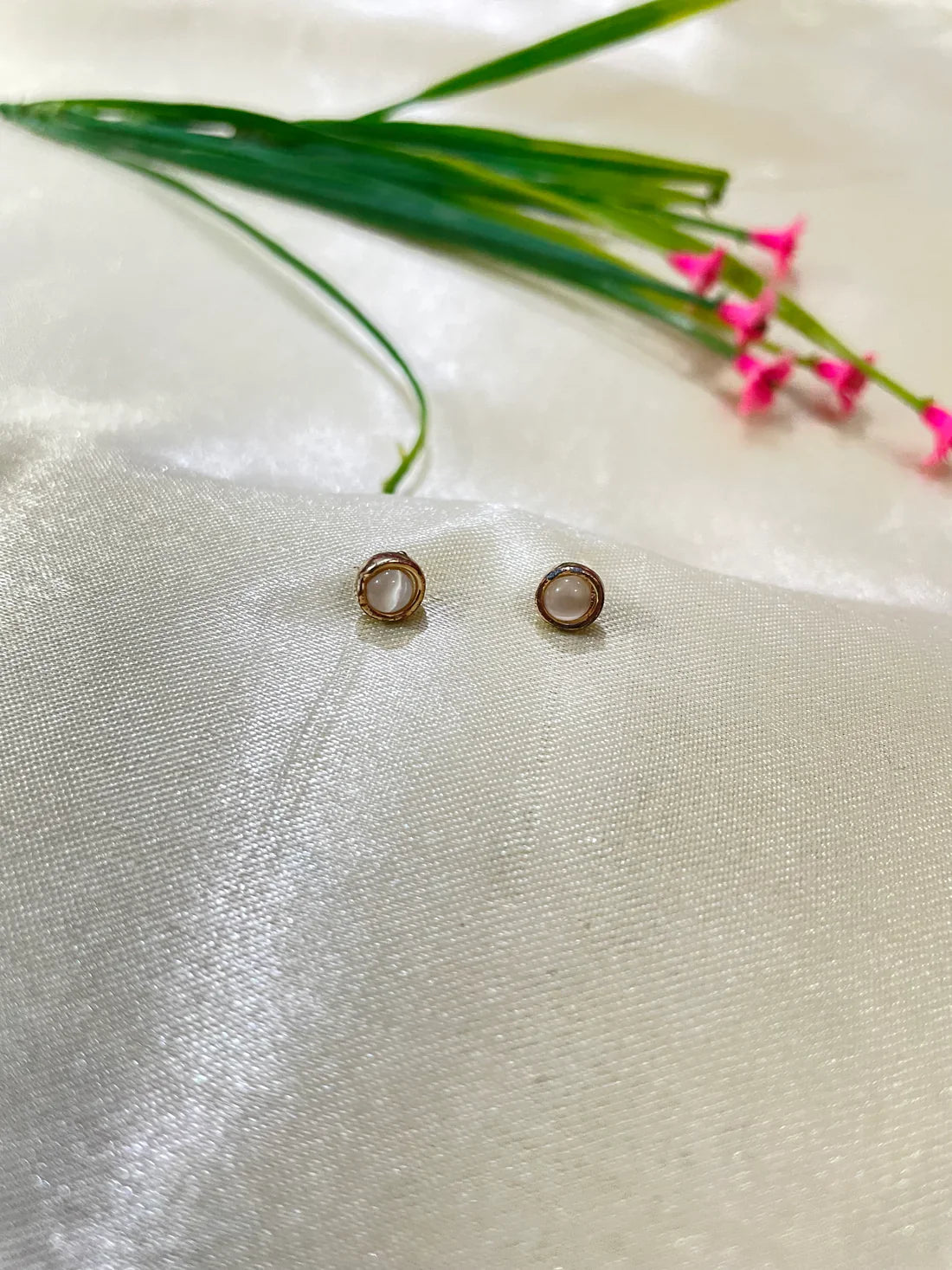 White and Golden ear studs