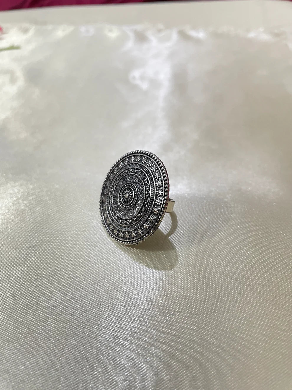 Silver circle ring with dark shade