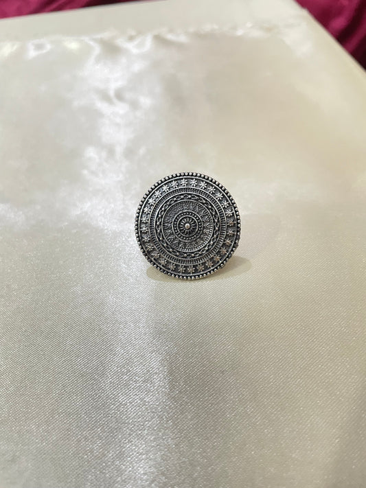 Silver circle ring with dark shade